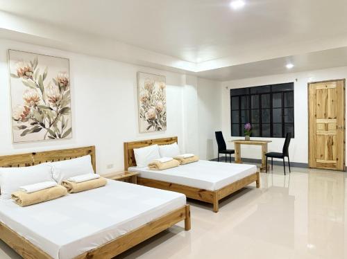 Ένα ή περισσότερα κρεβάτια σε δωμάτιο στο The Sagada Hotel