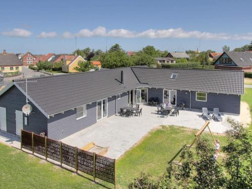 an aerial view of a house with a large backyard at Luxury Pool Villa in Bagenkop - By Traum Ferienwohnungen in Bagenkop