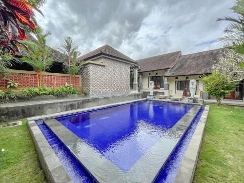 Gallery image of Urbanview Hotel Lilis Cempaka Mas Guesthouse in Canggu