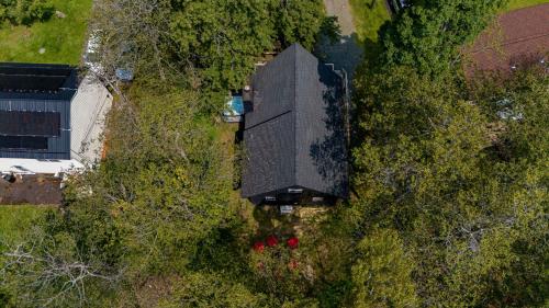 an overhead view of a house in the trees at Blue Diamond Hot Tub Fire Pit 3 BDR in Tobyhanna