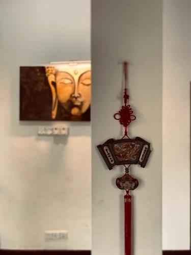 a clock on a wall in a museum at White Resort - 1 Min walk to the Beaches in Tangalle