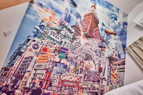 a painting of a building in the city at とまりーとStay 立会川 Tomareat Stay Tachiaigawa in Tokyo