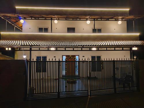 a black gate in front of a building at Luxury Heaven Valley in Kodaikānāl