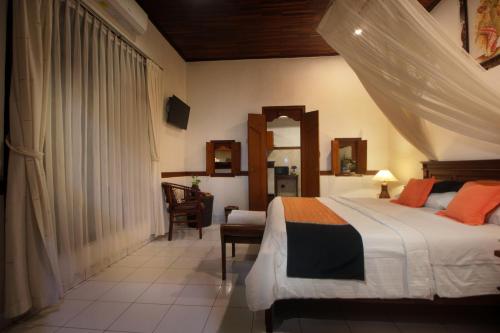 Katil atau katil-katil dalam bilik di Hotel Jati Sanur
