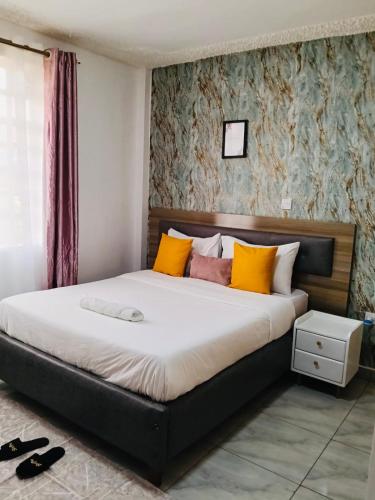 Postel nebo postele na pokoji v ubytování Eldoret Cozy 2-Bed Along Kisumu Road Near Maya