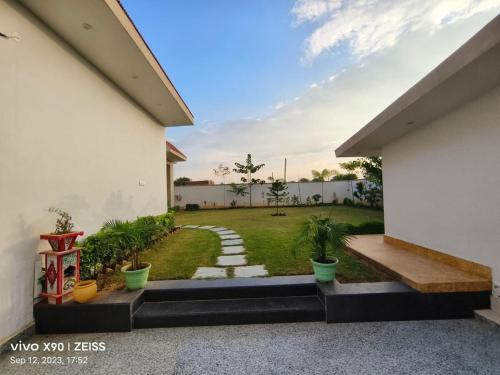 a view of a garden from a house at Elysium Retreat in Mohāna