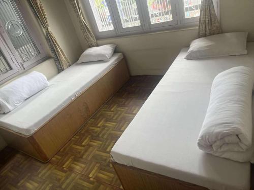Cama o camas de una habitación en Town Top Hotel & Resturant
