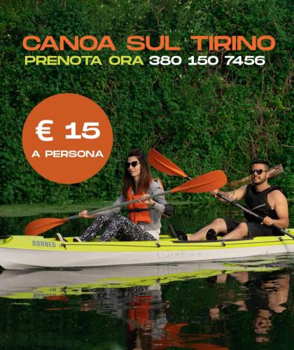 a man and a woman in a canoe on the water at Le Grazie in Popoli