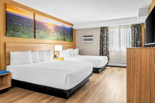 Postel nebo postele na pokoji v ubytování Days Inn by Wyndham Helena