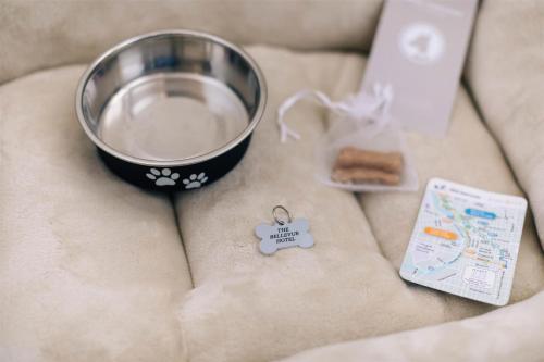 a bowl and a packet of food on a table at The Bellevue Hotel, in the Unbound Collection by Hyatt in Philadelphia