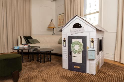 a play house in the middle of a living room at The Bellevue Hotel, in the Unbound Collection by Hyatt in Philadelphia