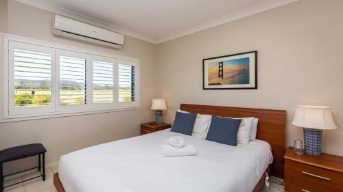 a bedroom with a bed and a window at 'Mandalay Villa 2' in Paxton