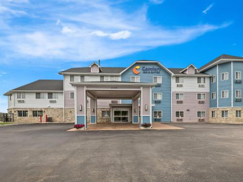 a large building with a parking lot in front of it at Comfort Inn & Suites Bellevue - Omaha Offutt AFB in Bellevue