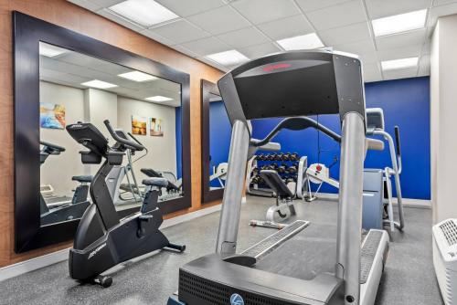 a gym with treadmills and elliptical machines at Comfort Inn Largo-Washington DC East in Upper Marlboro