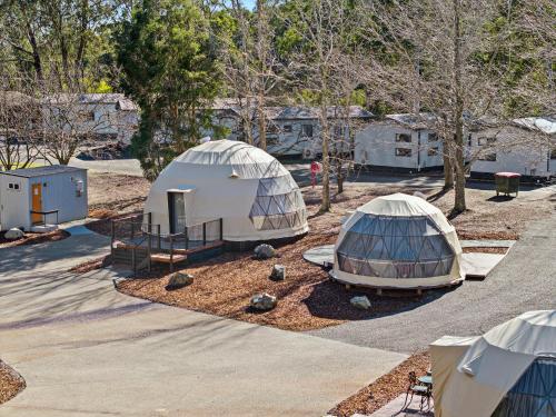 a group of tents in a parking lot at BIG4 Yarra Valley Park Lane Holiday Park in Healesville