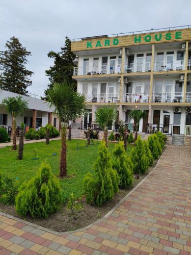 a large building with a sign that reads kend house at KARD HOUSE in Kobuleti