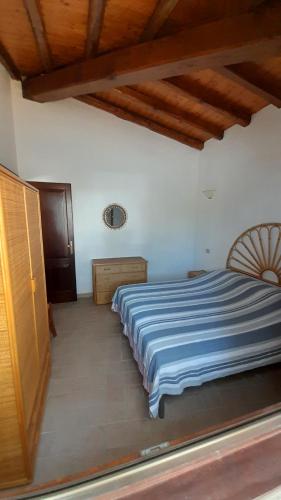 Ένα ή περισσότερα κρεβάτια σε δωμάτιο στο Villetta molarotto