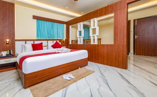 Ένα ή περισσότερα κρεβάτια σε δωμάτιο στο Yashshree Bangla Queen