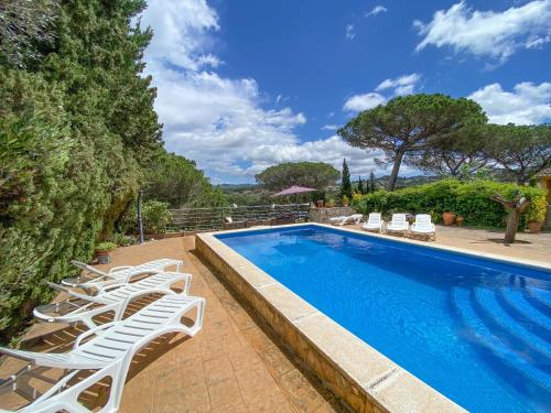 Bazén v ubytování Casa Iako nebo v jeho okolí