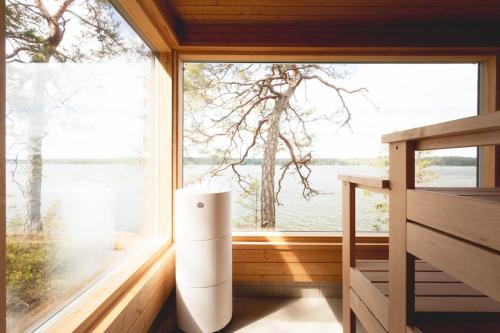 a room with a window with a view of the water at Stay North - Harmonia 