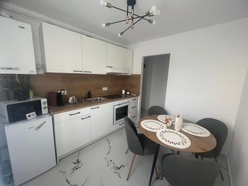 Kuchyň nebo kuchyňský kout v ubytování Saltwater Apartments