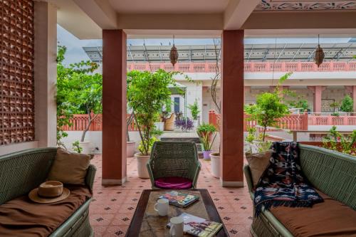 Suryaa Villa - A Boutique Heritage Hotelにあるシーティングエリア