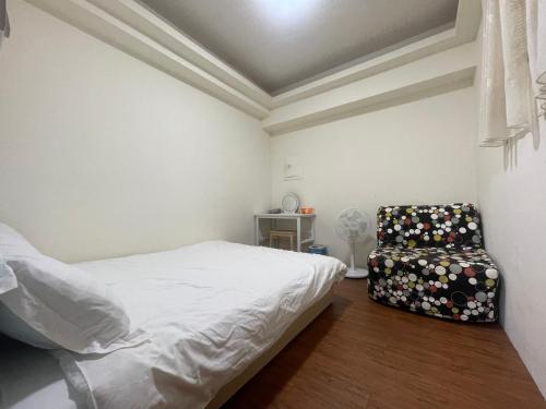 Postel nebo postele na pokoji v ubytování 羅東 Bliss Home 近羅東車站 整層包棟含停車位