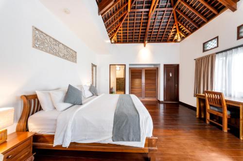 Katil atau katil-katil dalam bilik di djabu Canggu Beach Villa