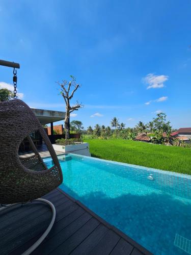 Πισίνα στο ή κοντά στο Teduh Teduh Villa Pakem