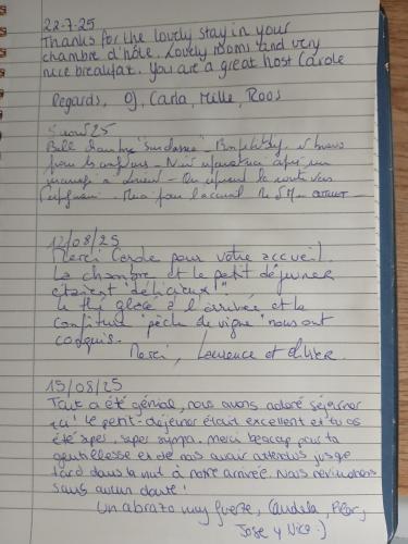 a letter written in handwriting on a piece of paper at Le Cosy Cabarieu in Saint-André-de-Cubzac