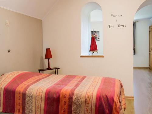 Ένα ή περισσότερα κρεβάτια σε δωμάτιο στο Villa in Biטvre with garden