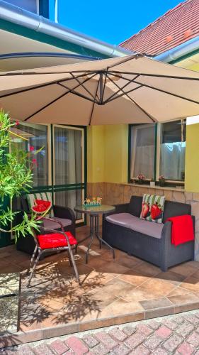 Coin salon dans l'établissement Gardenia Apartman