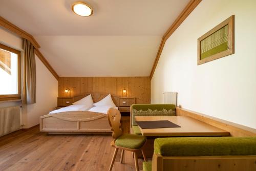 Postel nebo postele na pokoji v ubytování Hotel Christoph