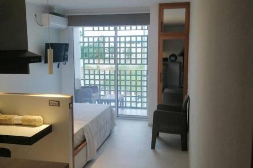 Кровать или кровати в номере Charming and Luminous Studio in Lake 1 Tunis