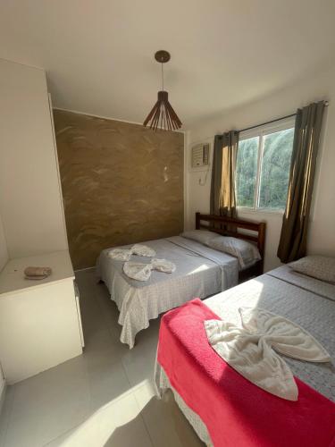 Postel nebo postele na pokoji v ubytování Cobertura Duplex Porto Real Resort em Angra