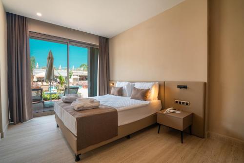 Prive Side Suite & Spa hotelにあるベッド