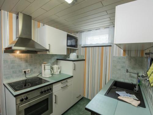 Η κουζίνα ή μικρή κουζίνα στο Sunny Terrace & Quiet Stay