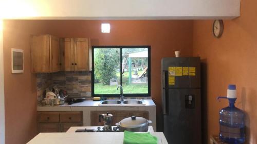 Kuchyň nebo kuchyňský kout v ubytování Casa Playa Rincon Hills Samana Las Galeras by BTC Group Crypto