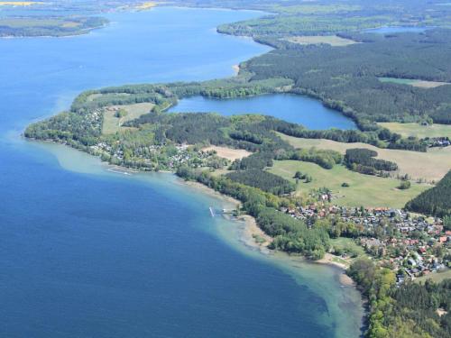 an aerial view of a group of islands in the water at Cozy Stuer Nature Escape in Stuer