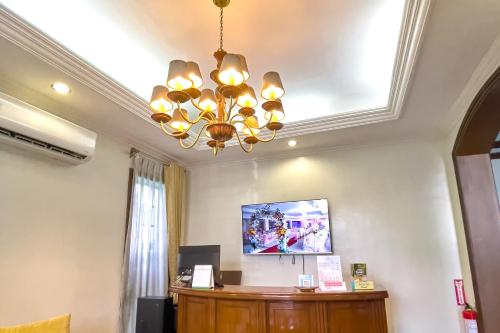 Televisyen dan/atau pusat hiburan di Laurel Heritage Resort and Spa
