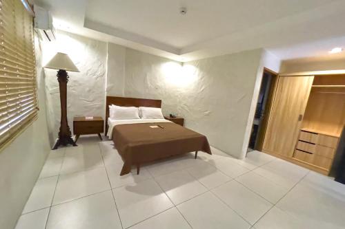 Katil atau katil-katil dalam bilik di Laurel Heritage Resort and Spa