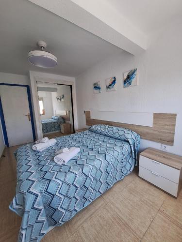 Ένα ή περισσότερα κρεβάτια σε δωμάτιο στο Apartamento Alfonso Barbate