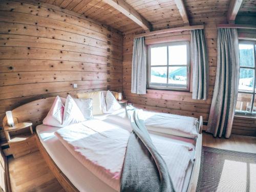 Ένα ή περισσότερα κρεβάτια σε δωμάτιο στο Cozy holiday apartment close to the slopes
