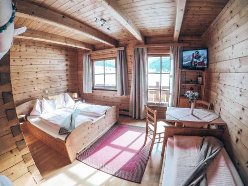 Ένα ή περισσότερα κρεβάτια σε δωμάτιο στο Cozy holiday apartment close to the slopes