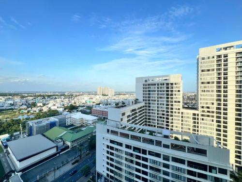 an aerial view of a city with tall buildings at StayX Luxury Apartment near SECC in Ho Chi Minh City