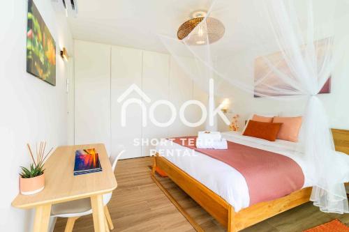 Ένα ή περισσότερα κρεβάτια σε δωμάτιο στο Dream On por NOOK