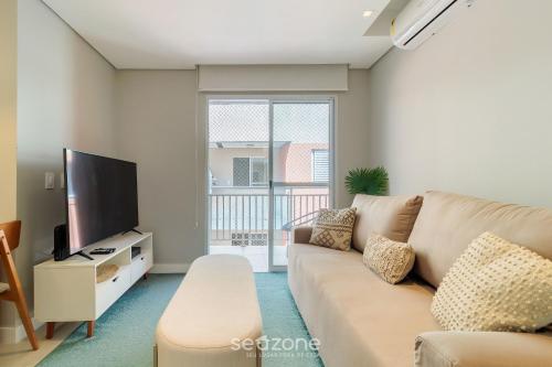 Μια τηλεόραση ή/και κέντρο ψυχαγωγίας στο Apto Charmoso a Apenas 600m do Mar! - VLA