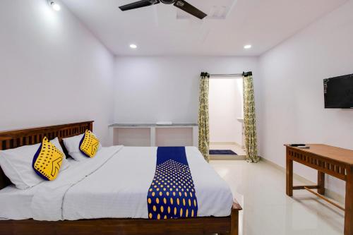 Katil atau katil-katil dalam bilik di Hotel O Hills Land