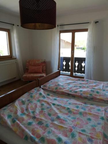 Ένα ή περισσότερα κρεβάτια σε δωμάτιο στο Ferienhaus Anni