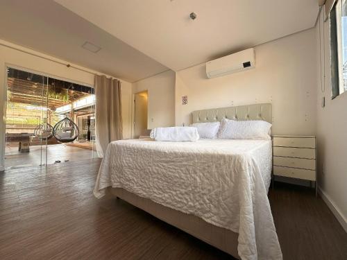 Ένα ή περισσότερα κρεβάτια σε δωμάτιο στο Villela Home Stay - Villa Kubitschek - Lago Sul